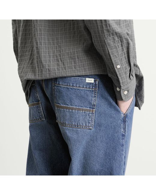 Forét Blue Clay Creased Denim Jeans for men