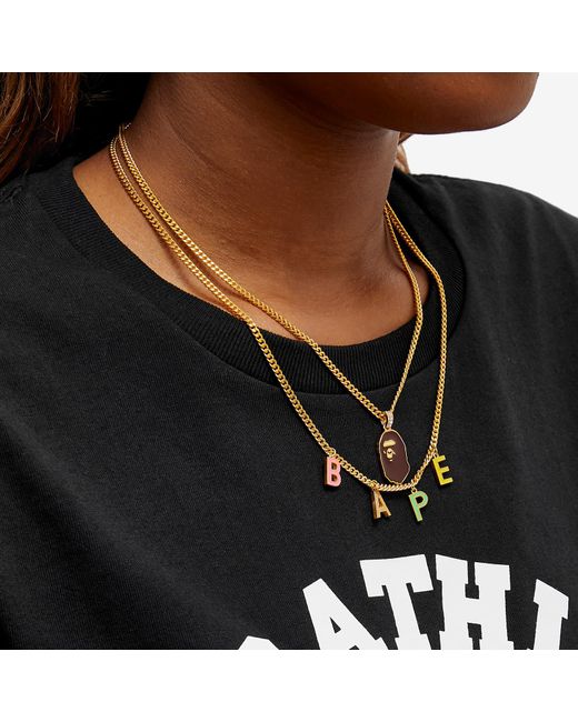 Gld ape shop pendant
