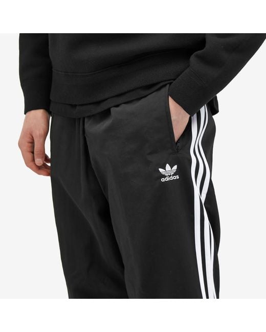 adidas Woven Firebird Track Pant in Black for Men