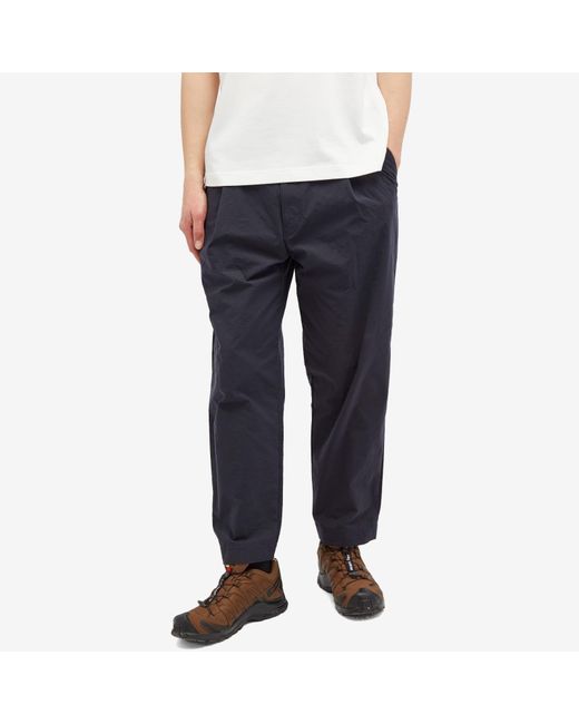 And Wander Blue Nylon Chino Tuck Tapered Pants for men