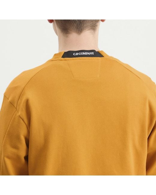 C P Company Orange Diagonal Raised Fleece Crewneck Lens Sweatshirt for men