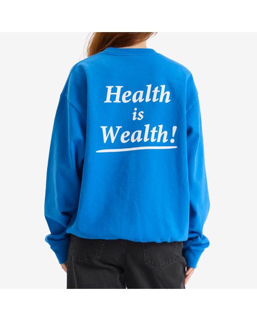 Sporty & Rich Blue Health Is Wealth Crew Sweatshirt