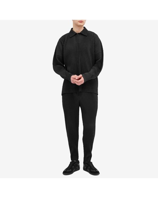 Homme Plissé Issey Miyake Black Pleated Tapered Trousers for men