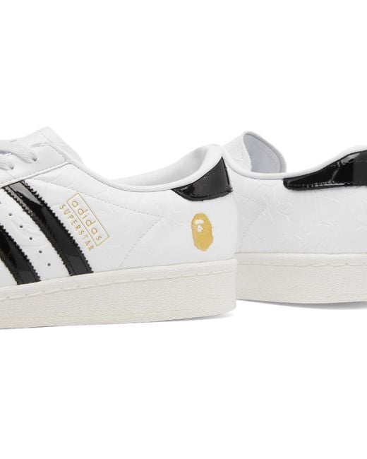 adidas gazelle silver green womens Adidas x BAPE Unisex Superstar Vintage White / Black Low Top Sneakers
