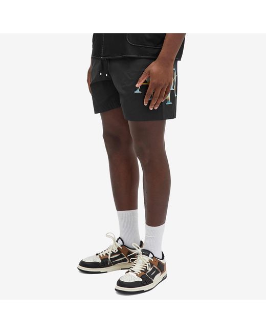 Amiri Black Staggered Logo Swim Shorts for men