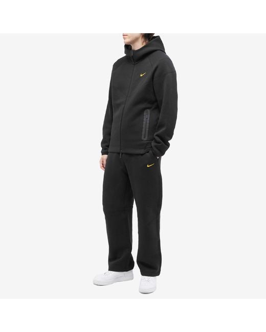 nike black tech tracksuit