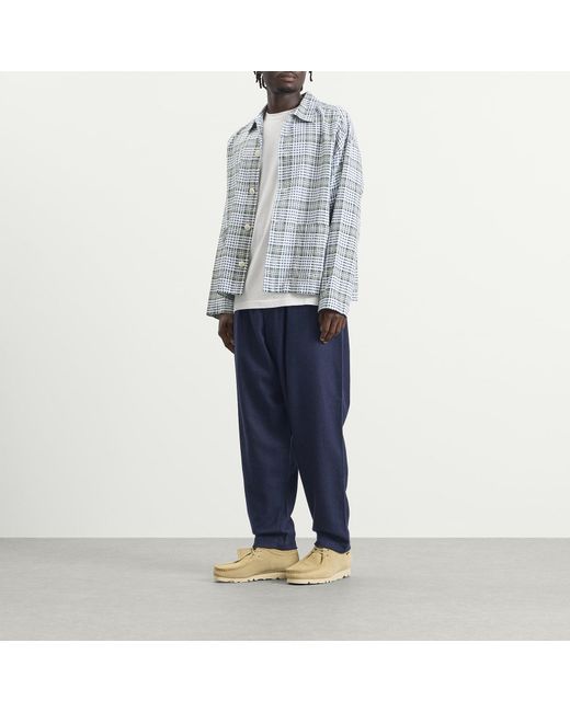 Universal Works Blue Wool Herringbone Pleated Track Pant for men
