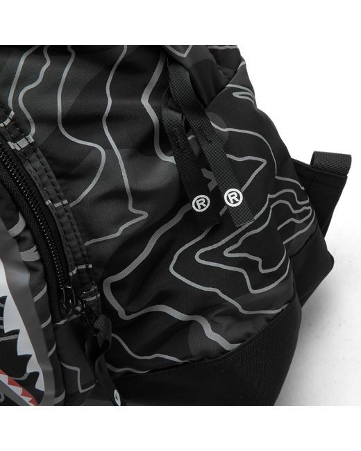 A Bathing Ape Black Layered Line Camo Shark Day Backpack for men