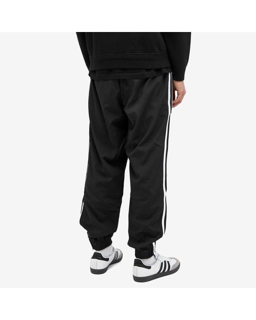 Adidas Black Woven Firebird Track Pant for men