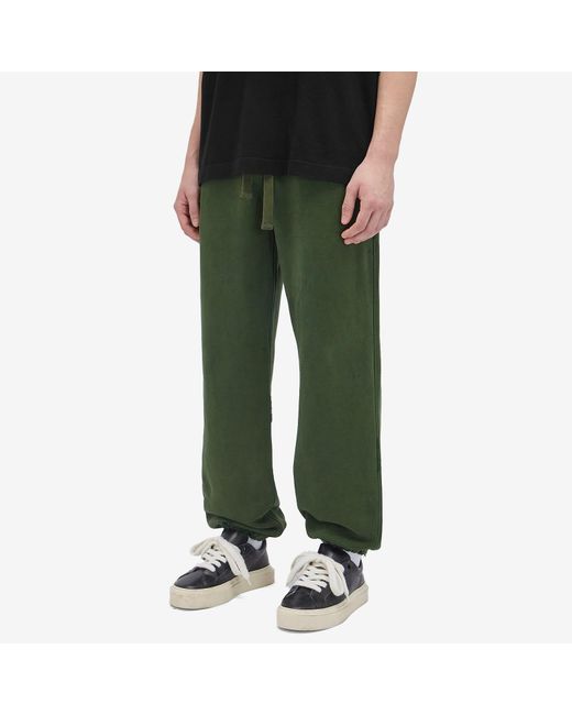 Cole Buxton Green Distressed Sweat Pants for men