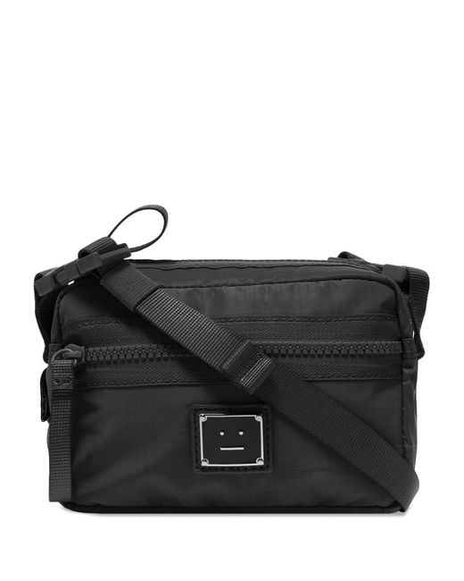 Acne Studios Aklia Plaque Face Cross Body Bag in Black for