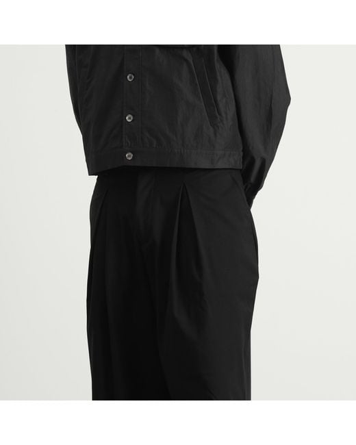 ANGLAN Black Valley Tuck Trousers for men