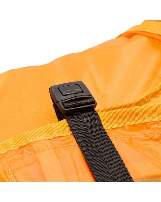 Montbell Orange U.L. Mono Bag for men