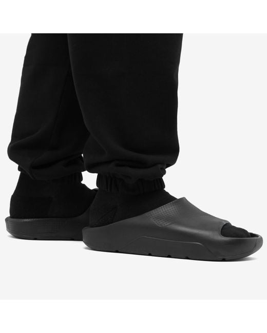 Nike Black Post Logo-embossed Rubber Sliders for men