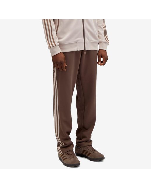 Adidas Brown Premium Essentials Track Pant for men