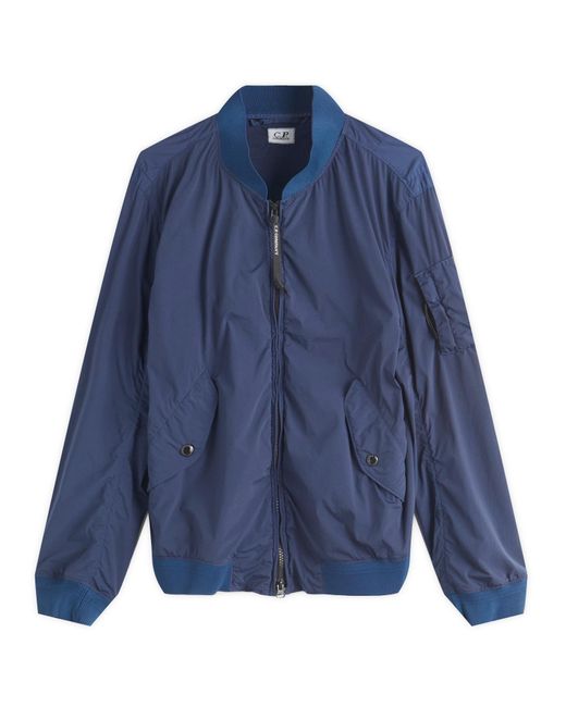 C P Company Blue Arm Lens Bomber Jacket for men