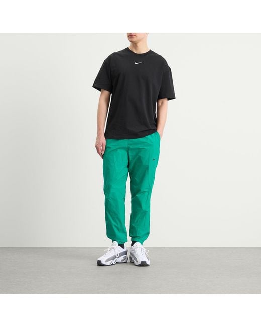 Nike Green X Nocta Cardinal Stock Woven Track Pant for men