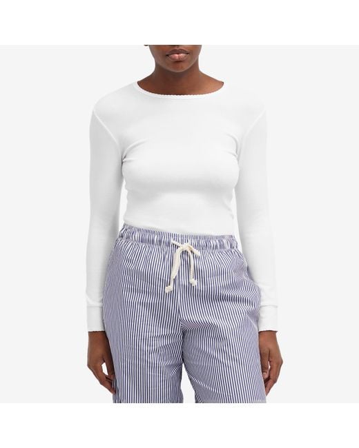 DONNI. White Baby Rib Scallop Long Sleeve Top