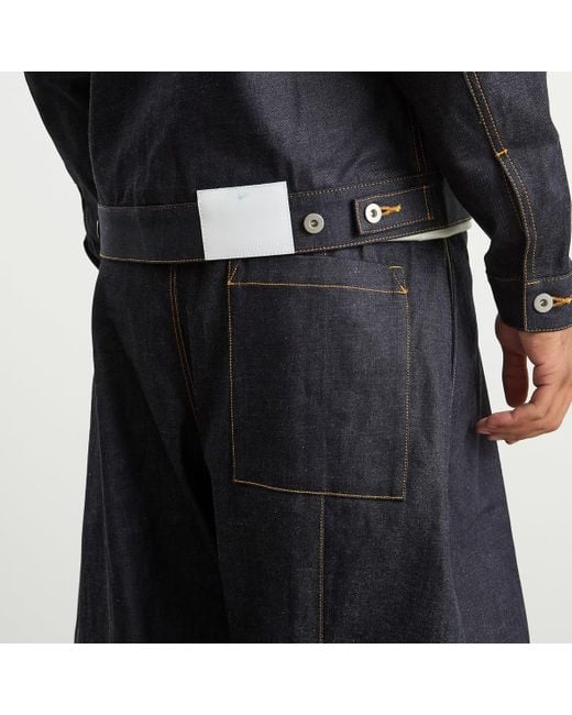 SAGE NATION Blue Raw Box Pleat Trouser for men