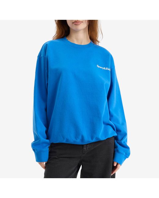 Sporty & Rich Blue Health Is Wealth Crew Sweatshirt