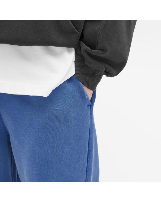 Cole Buxton Blue Distressed Sweat Pants for men