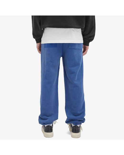 Cole Buxton Blue Distressed Sweat Pants for men