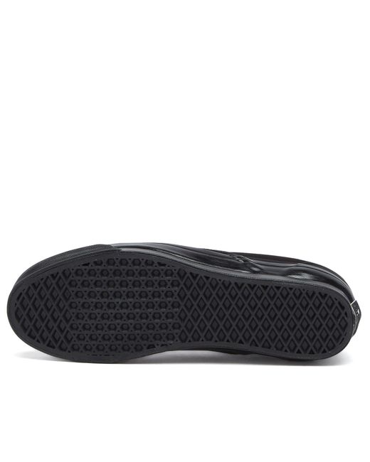 Vans Black Textile Slip-On Sneakers