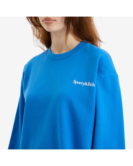 Sporty & Rich Blue Health Is Wealth Crew Sweatshirt