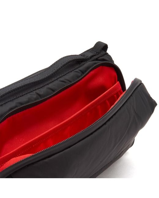 Topologie Black Polyester Bottle Sling Backpack