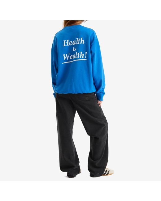 Sporty & Rich Blue Health Is Wealth Crew Sweatshirt