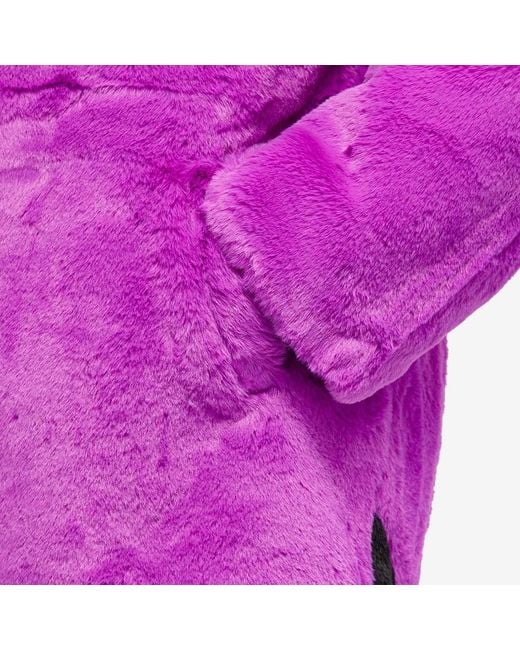 nike faux fur oversized swoosh jacket in purple