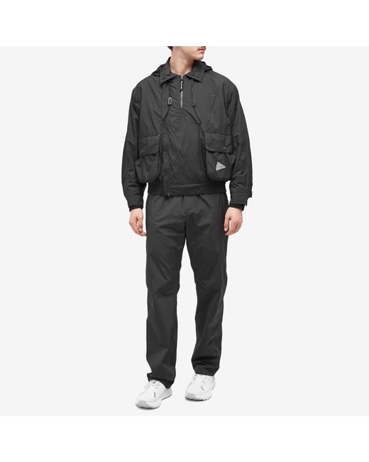 And Wander Black Water Repellant Light Popover Jacket for men