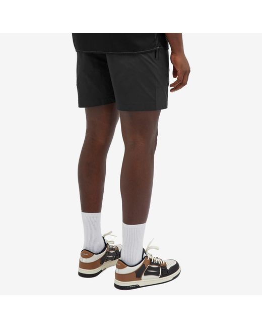 Amiri Black Staggered Logo Swim Shorts for men