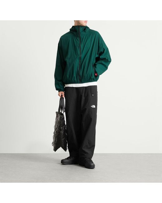 The North Face Green Redbox Packable Hooded Wind Jacket for men