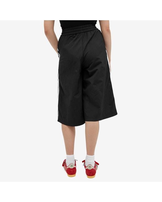 adidas Woven Capri Short in Black Lyst