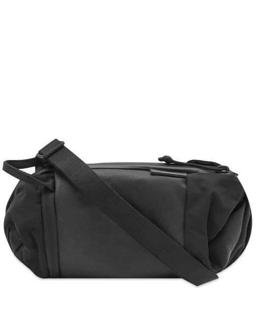 Côte&Ciel Mini Duffle Cross Body Bag in Black Lyst