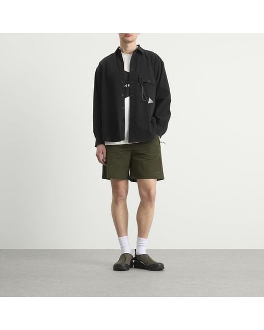 And Wander Black Dry Breathable Shirt for men