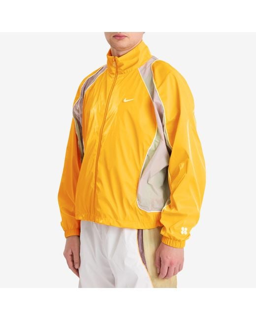 nike track jacket yellow
