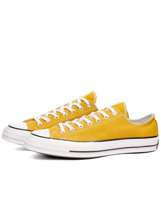 Converse 70's Chuck Low Canvas Sneakers in Yellow for Men - Save 69% ...