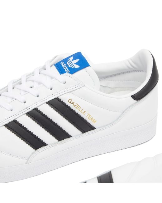 Mens adidas gazelle white with blue stripes sales