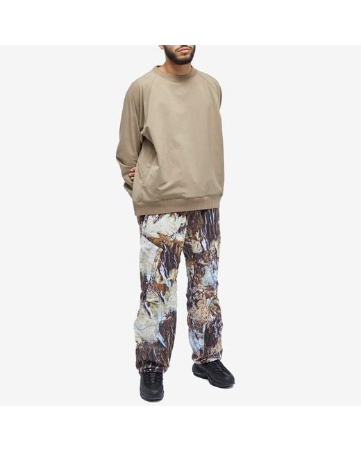 Nike camouflage track pants new arrivals