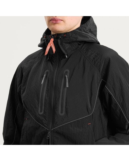 And Wander Black X Roa Ripstop Wind Jacket for men