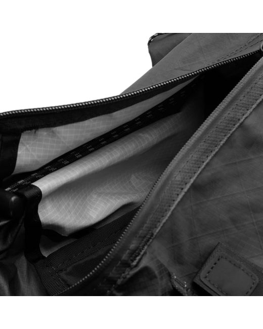 And Wander Black Ecopak 30L Backpack for men