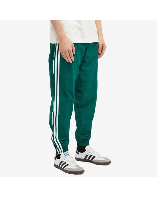Adidas Green Woven Firebird Track Pant for men