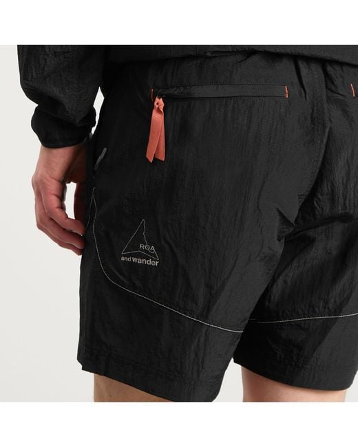 And Wander Black X Roa Ripstop Wind Shorts for men