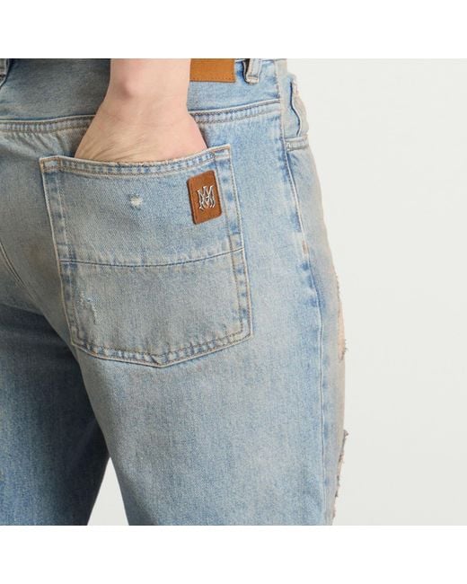 Amiri Blue Repaired Boot Cut Jeans for men