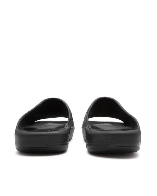 Nike Black Post Logo-embossed Rubber Sliders for men