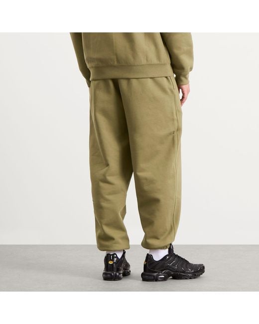 Nike Green Solo Swoosh Cuff Pant for men