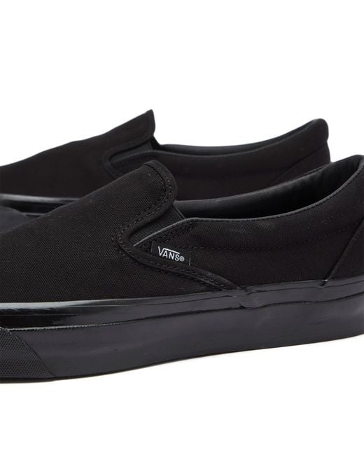 Vans Black Textile Slip-On Sneakers