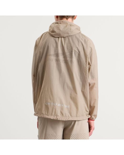 And Wander Brown X Altra Ventilation Wind Jacket for men